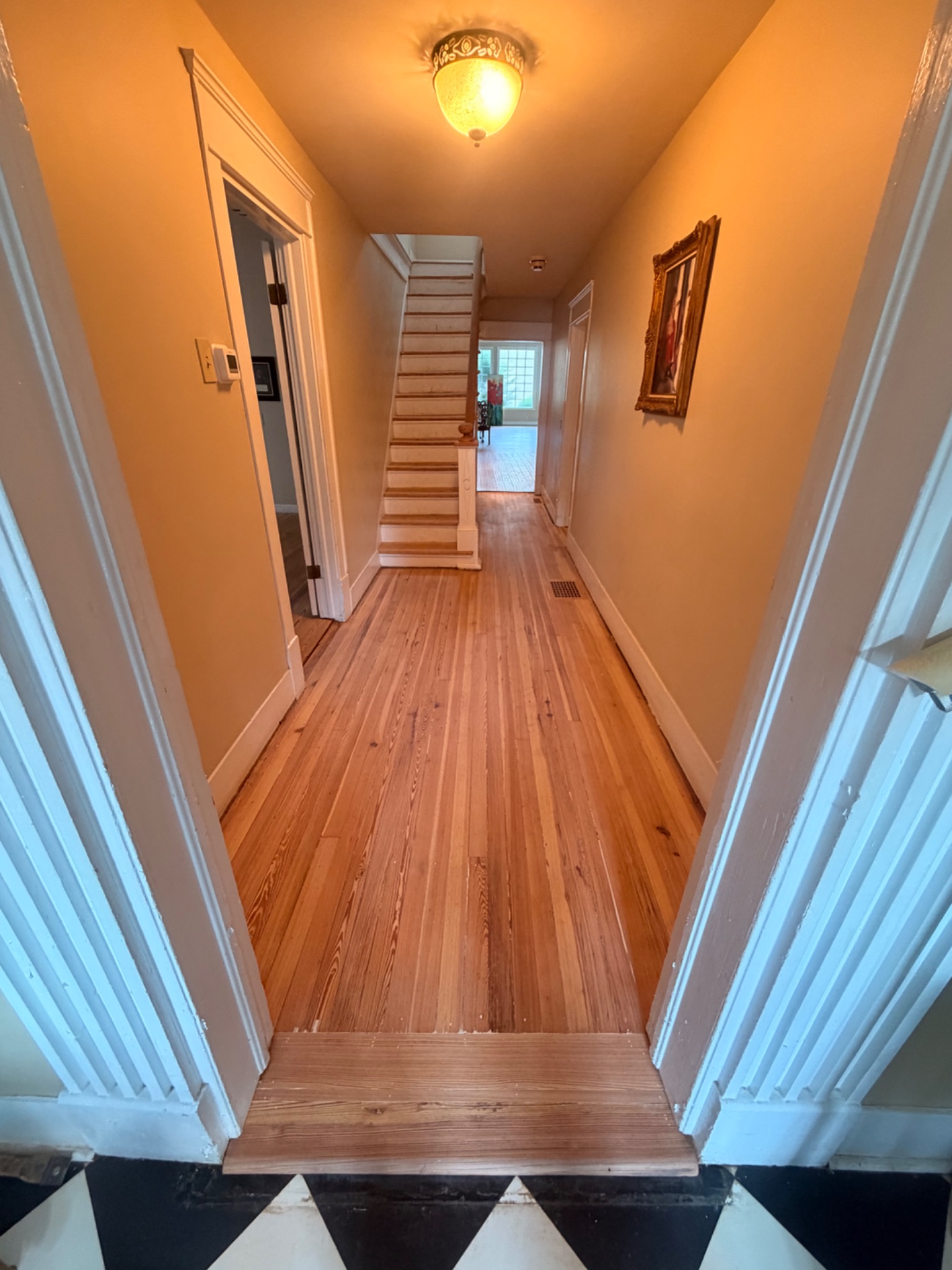 Finished original pine floor in the Historic Naylor Hall hallway